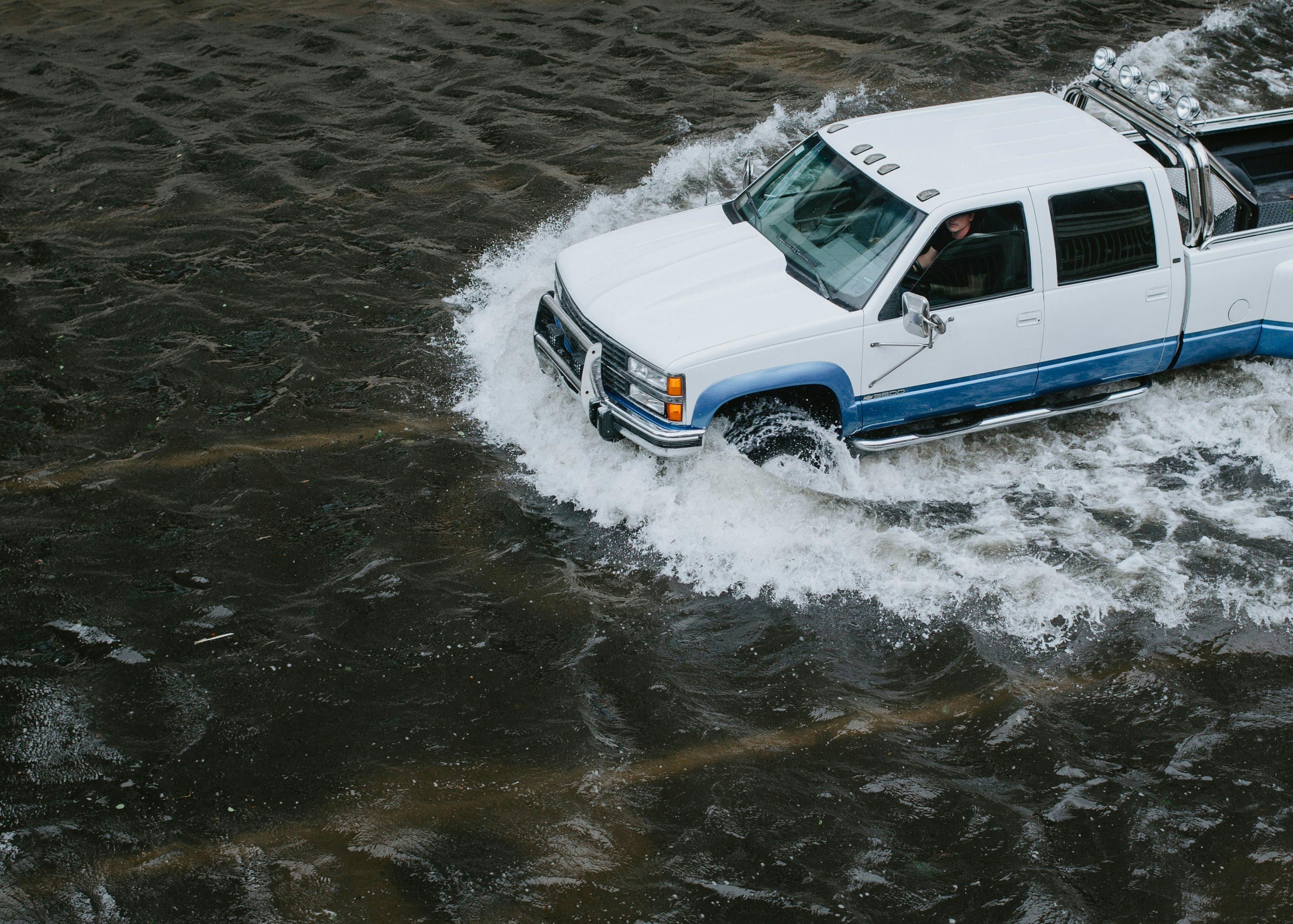 White crew cab truck after Hurricane Irma: ©Wade Austin Ellis - unsplash.com
