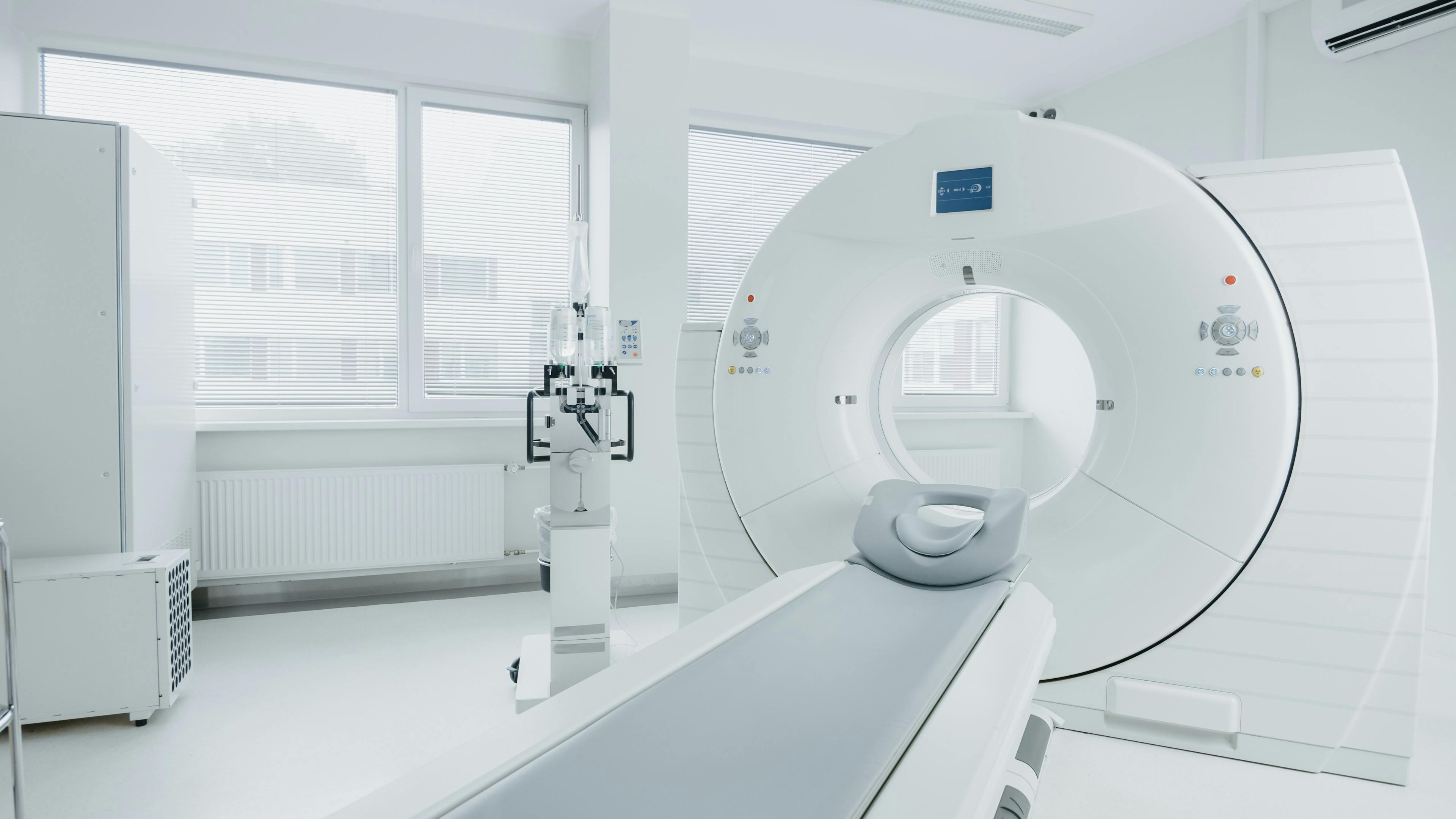 Image Credit: © Gorodenkoff - www.stock.adobe.com | Medical CT or MRI or PET Scan Standing in the Modern Hospital Laboratory. Technologically Advanced and Functional Mediсal Equipment in a Clean White Room.